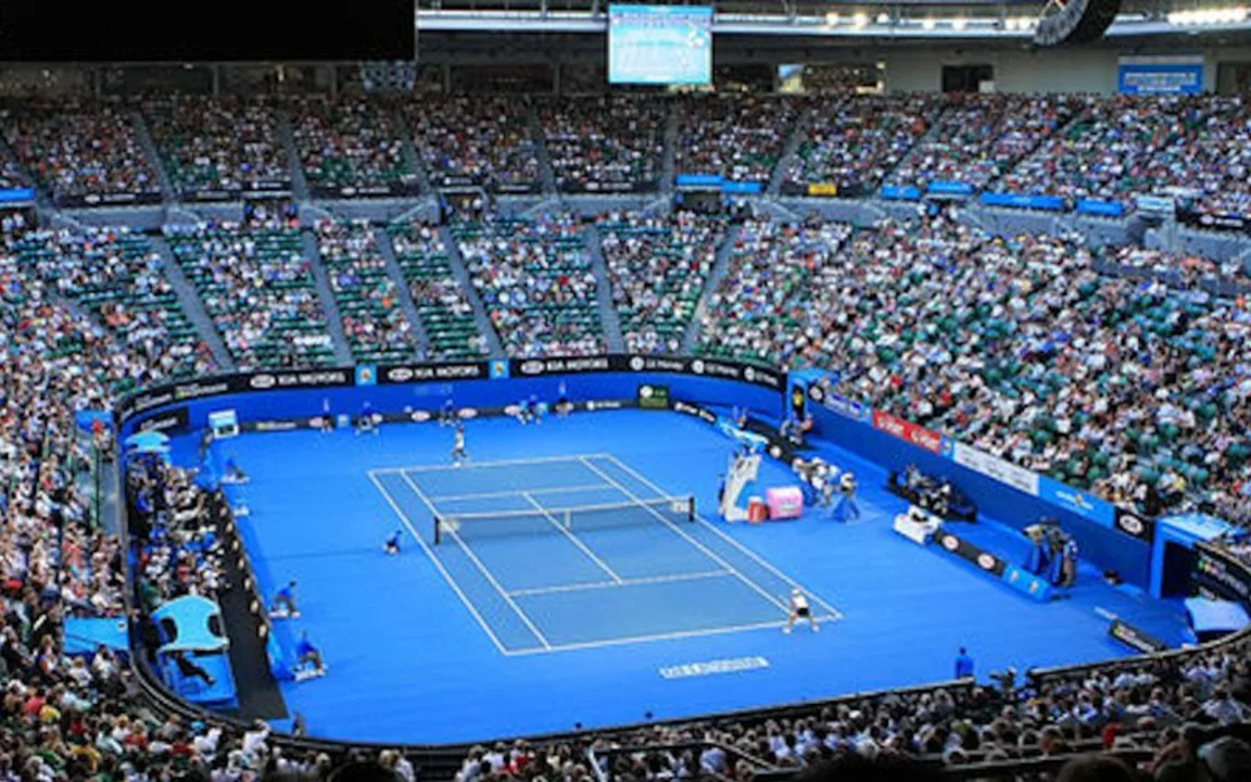 Which tennis open is played on Plexicushion courts?